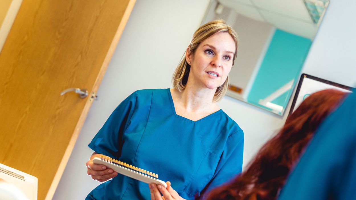 dentist discussing treatment with a patient